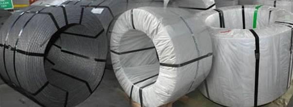 Several rolls of PC steel wire on the ground with woven bag package.